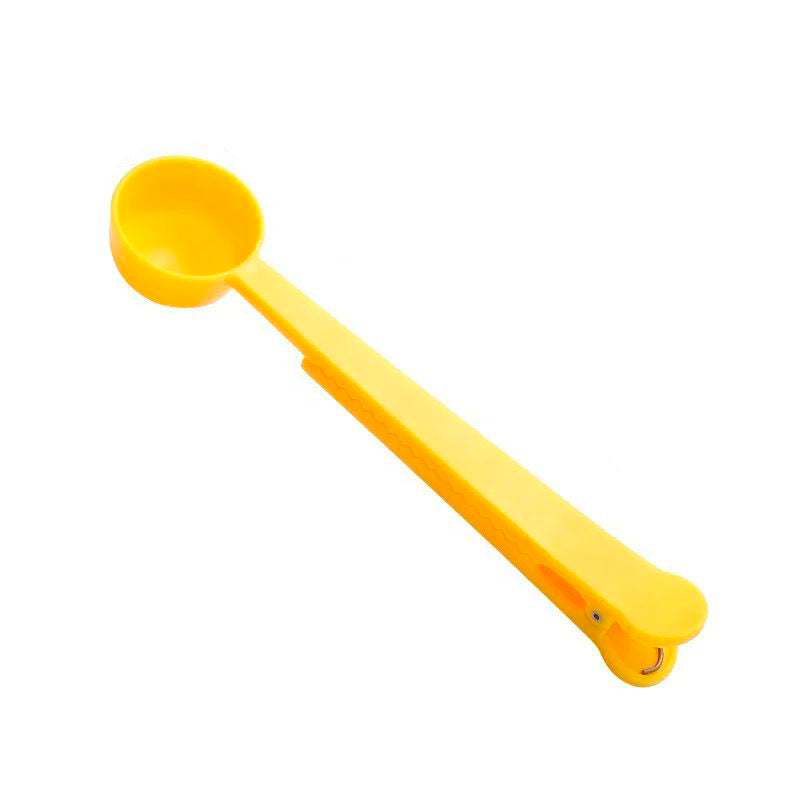 Cuchara medidora con clip de sellado