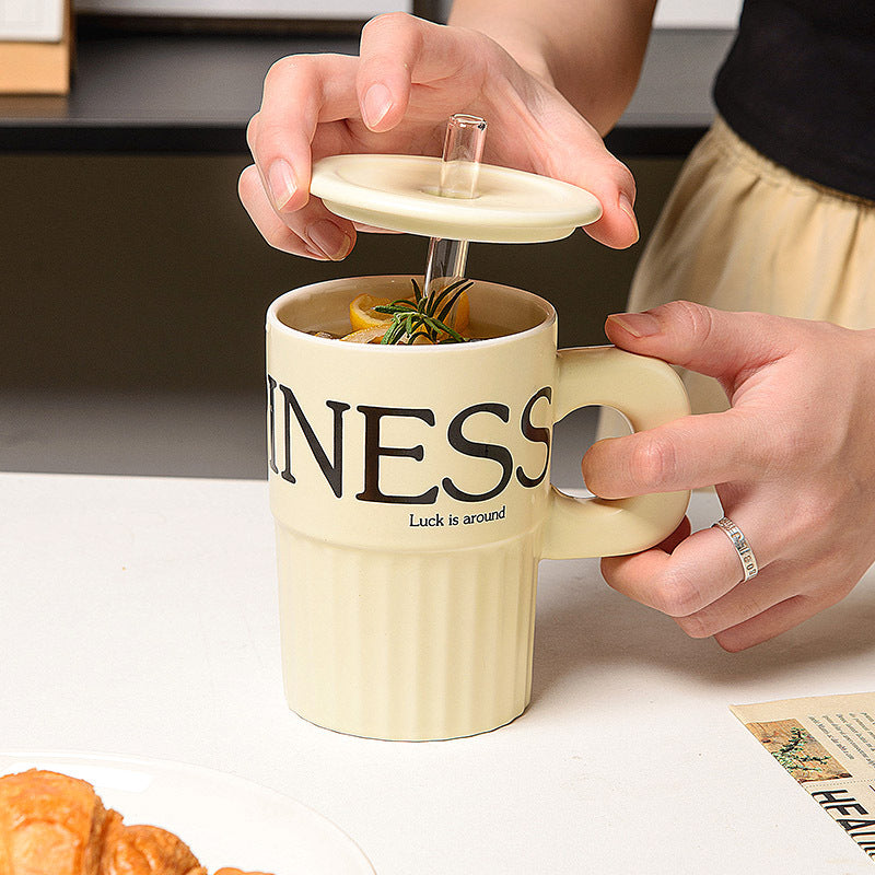 Taza de cerámica con sorbete reutilizable