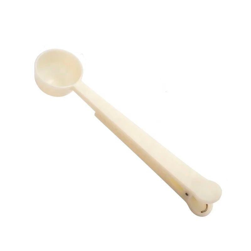 Cuchara medidora con clip de sellado