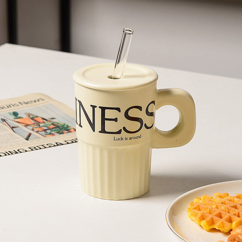 Taza de cerámica con sorbete reutilizable