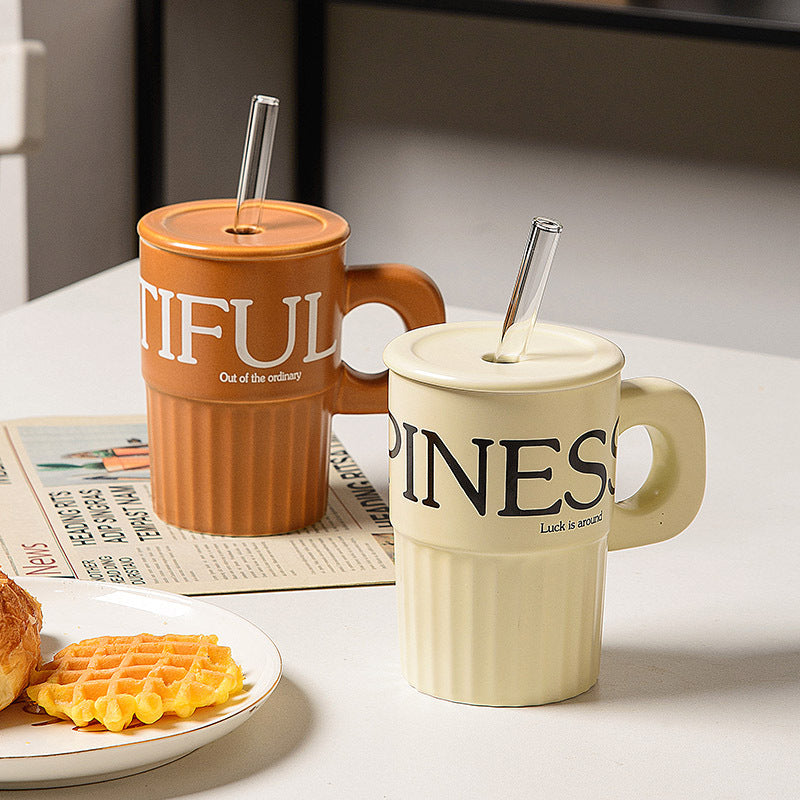 Taza de cerámica con sorbete reutilizable